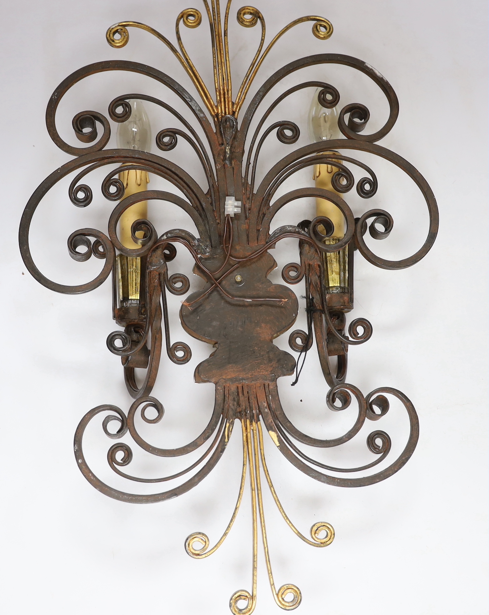 A Maison Bagues wrought iron and glass wall light, 50cm high